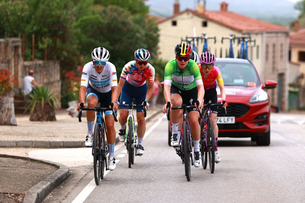 LAGUNAS DE NEILA SPAIN MAY 22 LR Lucinda Brand of Netherlands and Team Trek Segafredo and Lotte Kopecky of Belgium and Team SD Worx Green Points Jersey compete in the breakaway during the 7th Vuelta a Burgos Feminas 2022 Stage 4 a 1251km stage from Covarrubias to Lagunas de Neila 1867m VueltaBurgos BurgosFem UCIWWT on May 22 2022 in Lagunas de Neila Spain Photo by Gonzalo Arroyo MorenoGetty Images
