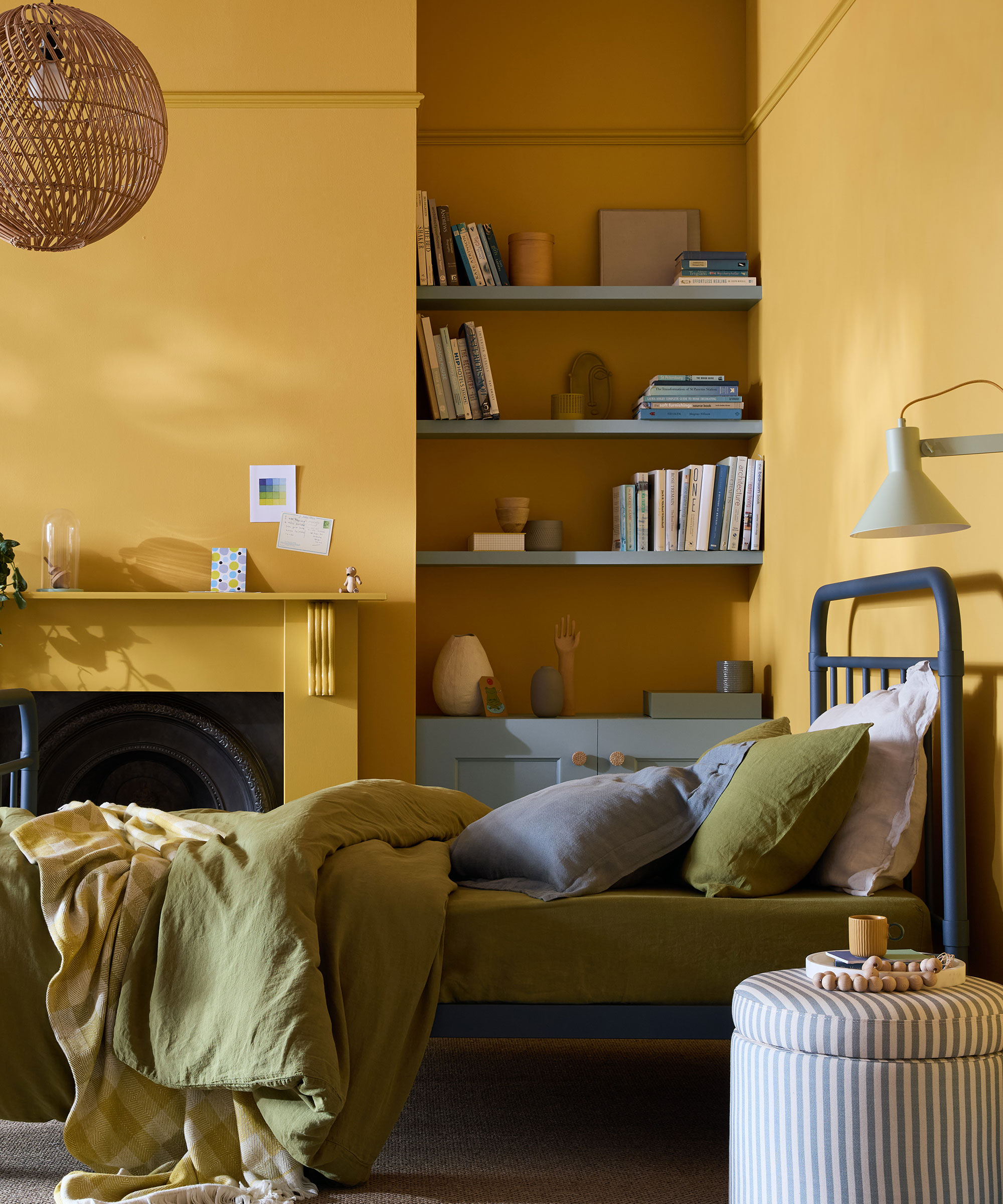yellow colour drenched bedroom