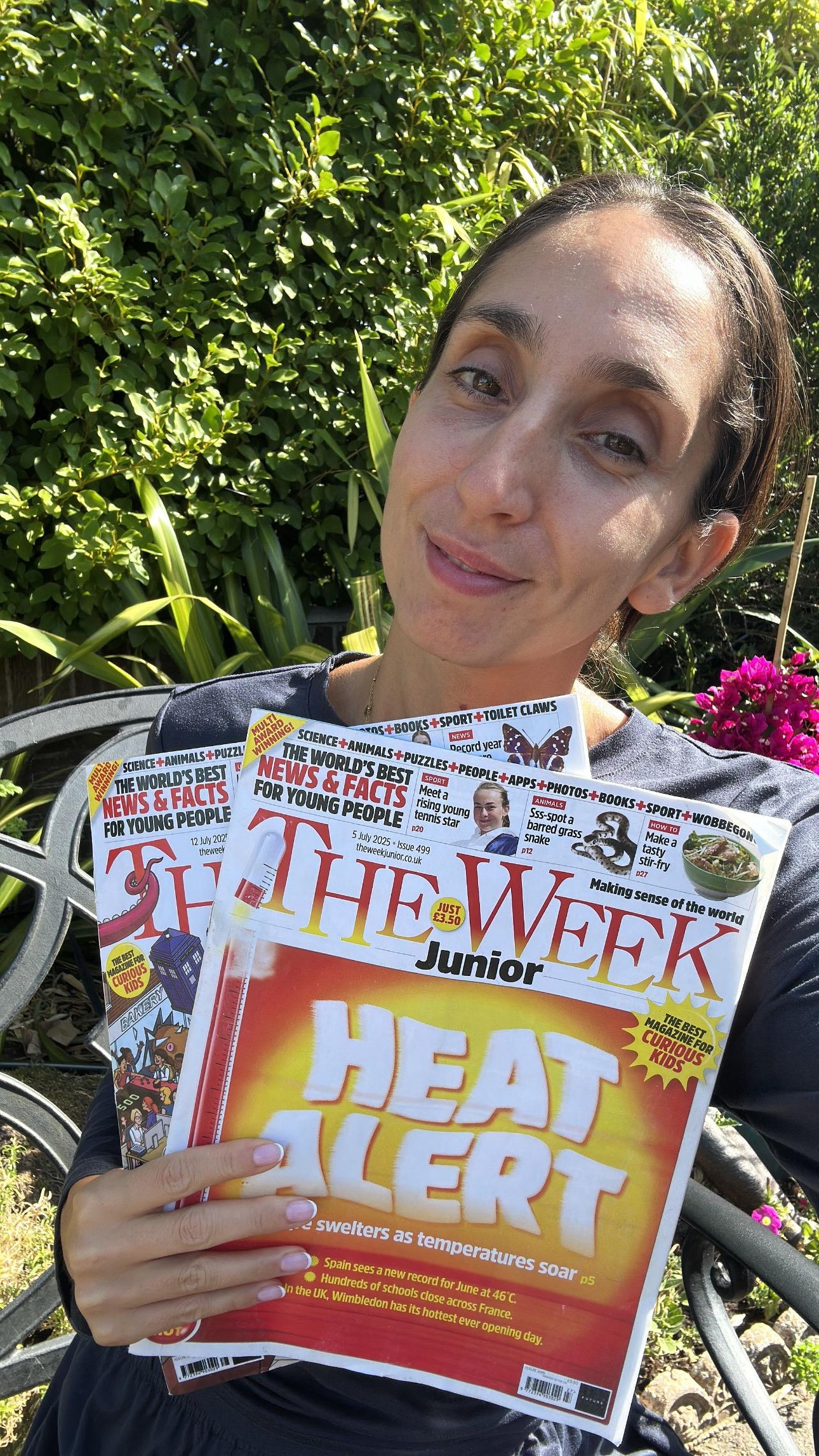 Jemma holding The Week Junior