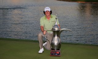 Rory McIlroy pictured with the Dubai Desert Classic trophy in 2009