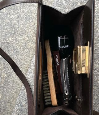 Handbag with beauty products inside