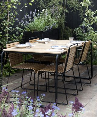 small patio dining area with table and chairs