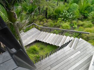 New Zealand beach front cabin entrance stairs