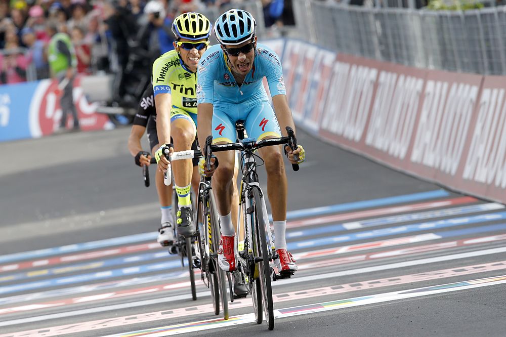 Fabio Aru leads Alberto Contador and Richie Porte across the line