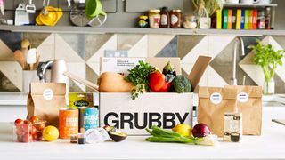 Grubby recipe box unpacked in kitchen