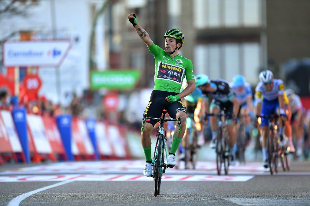 SUANCES SPAIN OCTOBER 30 Arrival Primoz Roglic of Slovenia and Team Jumbo Visma Green Points Jersey Celebration Andrea Bagioli of Italy and Team Deceuninck QuickStep Felix Grobschartner of Austria and Team BORA Hansgrohe during the 75th Tour of Spain 2020 Stage 10 a 185km stage from Castro Urdiales to Suances lavuelta LaVuelta20 La Vuelta on October 30 2020 in Suances Spain Photo by Justin SetterfieldGetty Images