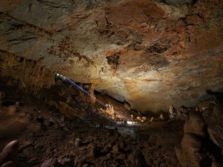 Photograph of Sam Davis in Cueva las Cosas, Cantabria, Spain. Photographed by Sam Davis