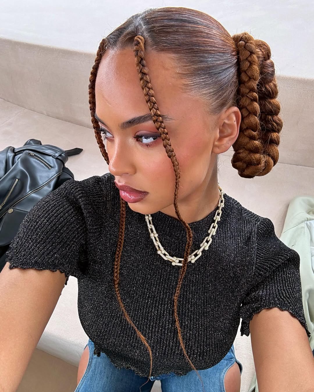 Paola Locatelli with pigtail braids