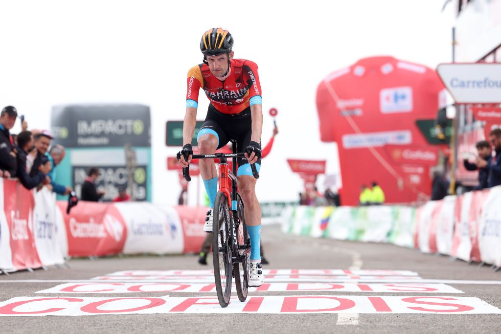 ALTU DE LANGLIRU SPAIN SEPTEMBER 13 Wout Poels of The Netherlands and Team Bahrain Victorious crosses the finish line during the 78th Tour of Spain 2023 Stage 17 a 1244km stage from Ribadesella Ribeseya to Altu de LAngliru 1555m UCIWT on September 13 2023 in Altu de LAngliru Spain Photo by Alexander HassensteinGetty Images