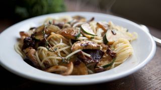 A bowl of mushroom and courgette pasta