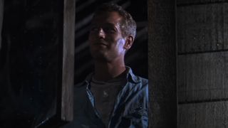 Paul Newman grins in Cool Hand Luke