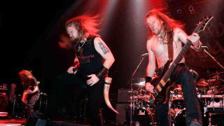 Amon Amarth performing onstage in 2008