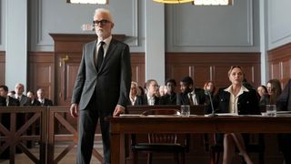 John Slattery as Leo F. Drummond standing up in court in an episode of The Rainmaker