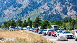 Visitors parked bumper to bumper along the road at Grand Teton National Park in Wyoming in 2020.