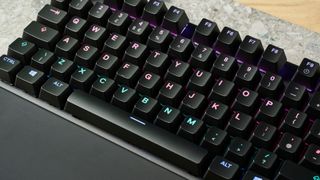 A black SteelSeries Apex Pro wired gaming keyboard