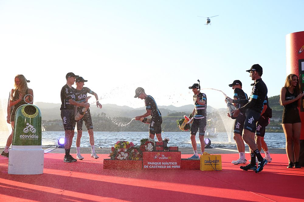 Team Sky riders celebrate on the Vuelta's stage 1 podium.