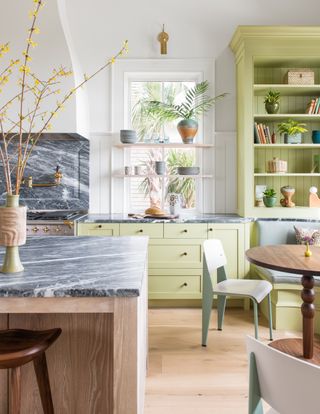 Green kitchen designed by Cortney Bishop