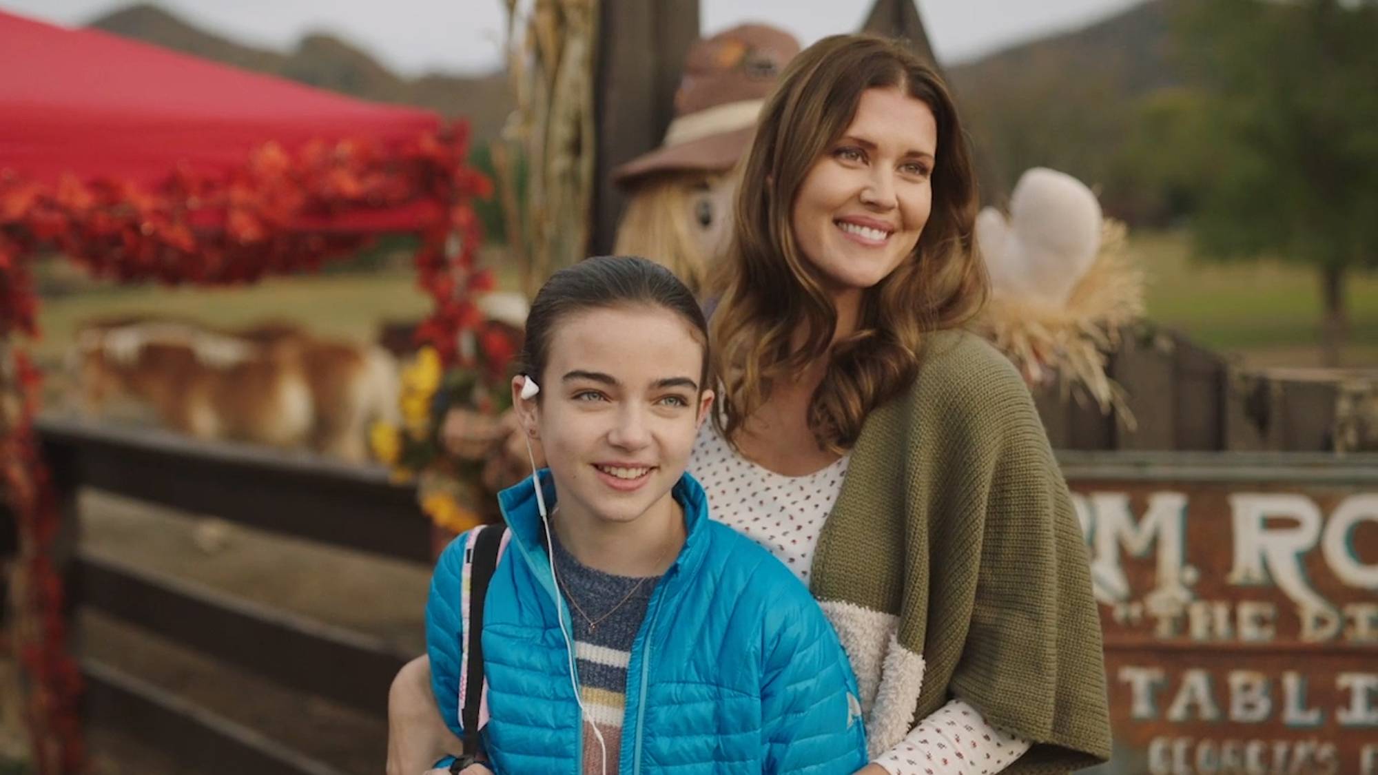 Taegen Burns and Sarah Lancaster in "Blue Ridge: The Series"