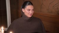 Kendall Jenner wears a brown turtleneck in an episode of The Kardashians.