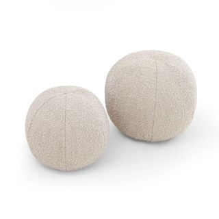 Two round boucle pillows