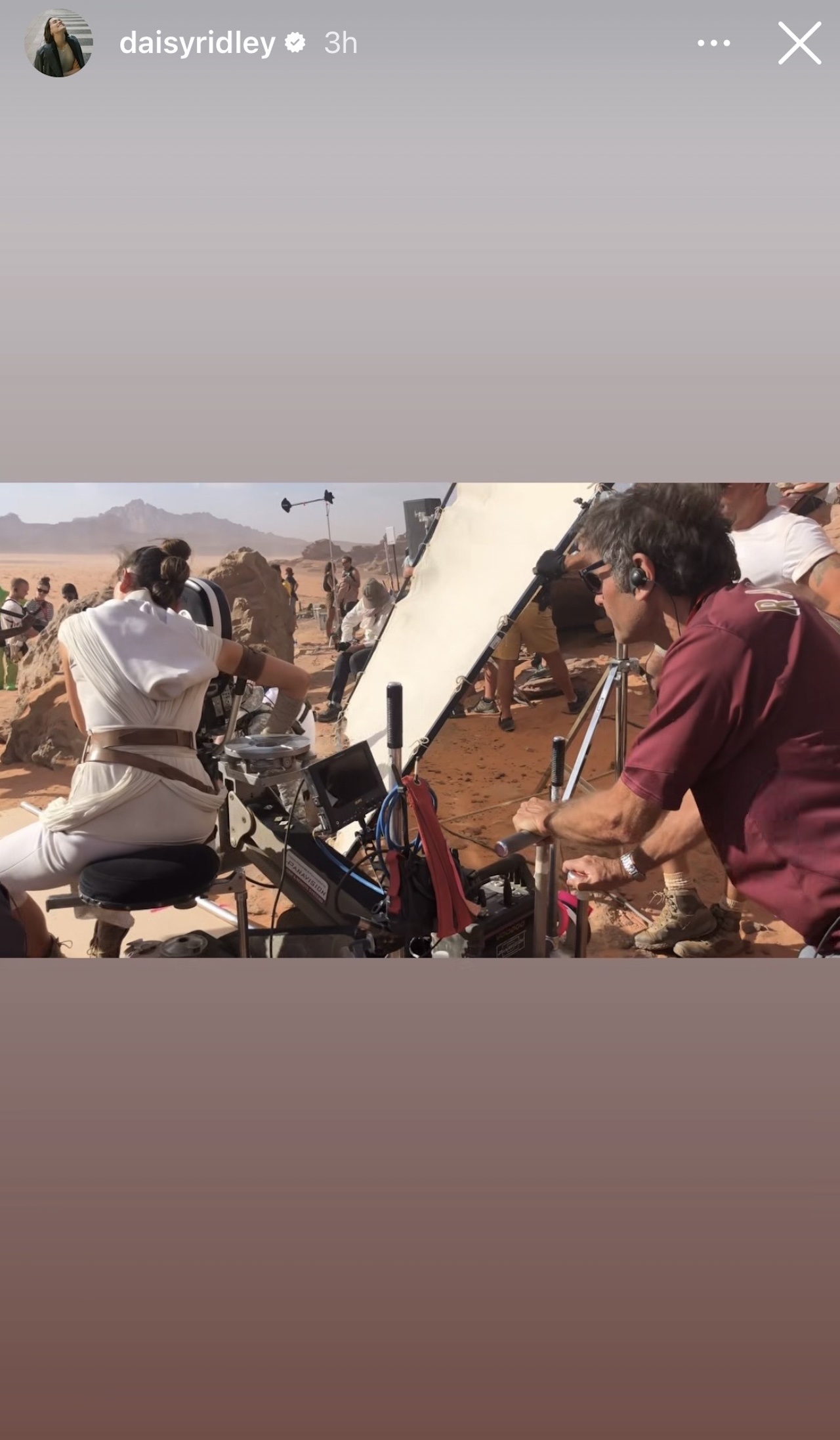 Daisy Ridley behind the camera in a BTS image from The Rise of Skywalker