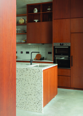 Stephanie O'Sullivan kitchen with terrazzo waterfall countertop