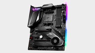 MSI MPG X570 Gaming Pro Carbon WiFi motherboard topdown view on grey background, with glowing side