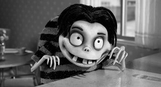 a boy in a striped shirt and with missing teeth in the movie frankenweenie