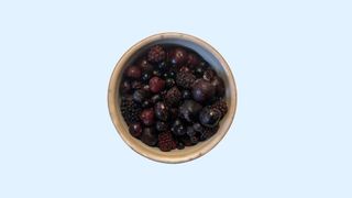 A bowlful of berries in a bowl, representing 200 calories of fruit