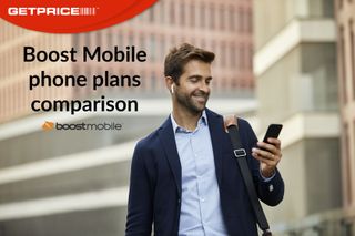 Man walking outside holding a phone and smiling at it with black writing in the top left corner that says Boost mobile phone plans comparison