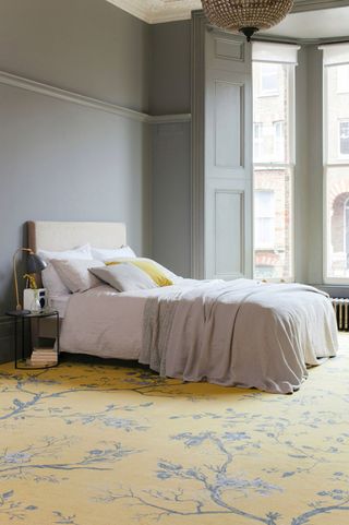 Traditional grey bedroom with yellow carpet by Brintons