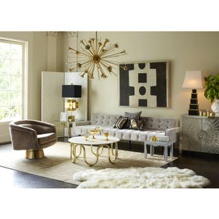 two rugs in a living room, faux fur rug in living room by Jonathan Adler