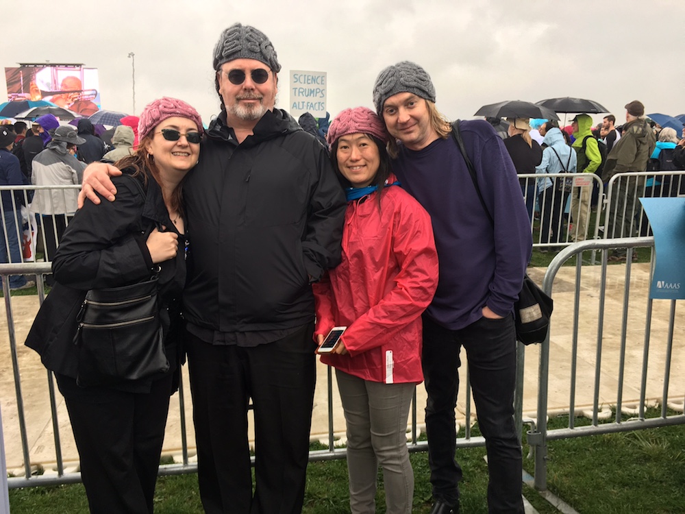Marchers in "brain hats" pose on the National Mall in Washington, D.C.