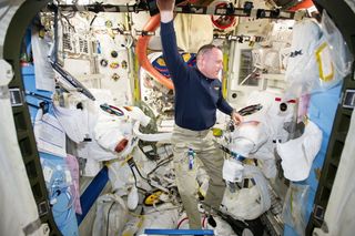 Wilmore Prepares U.S. Spacesuits 