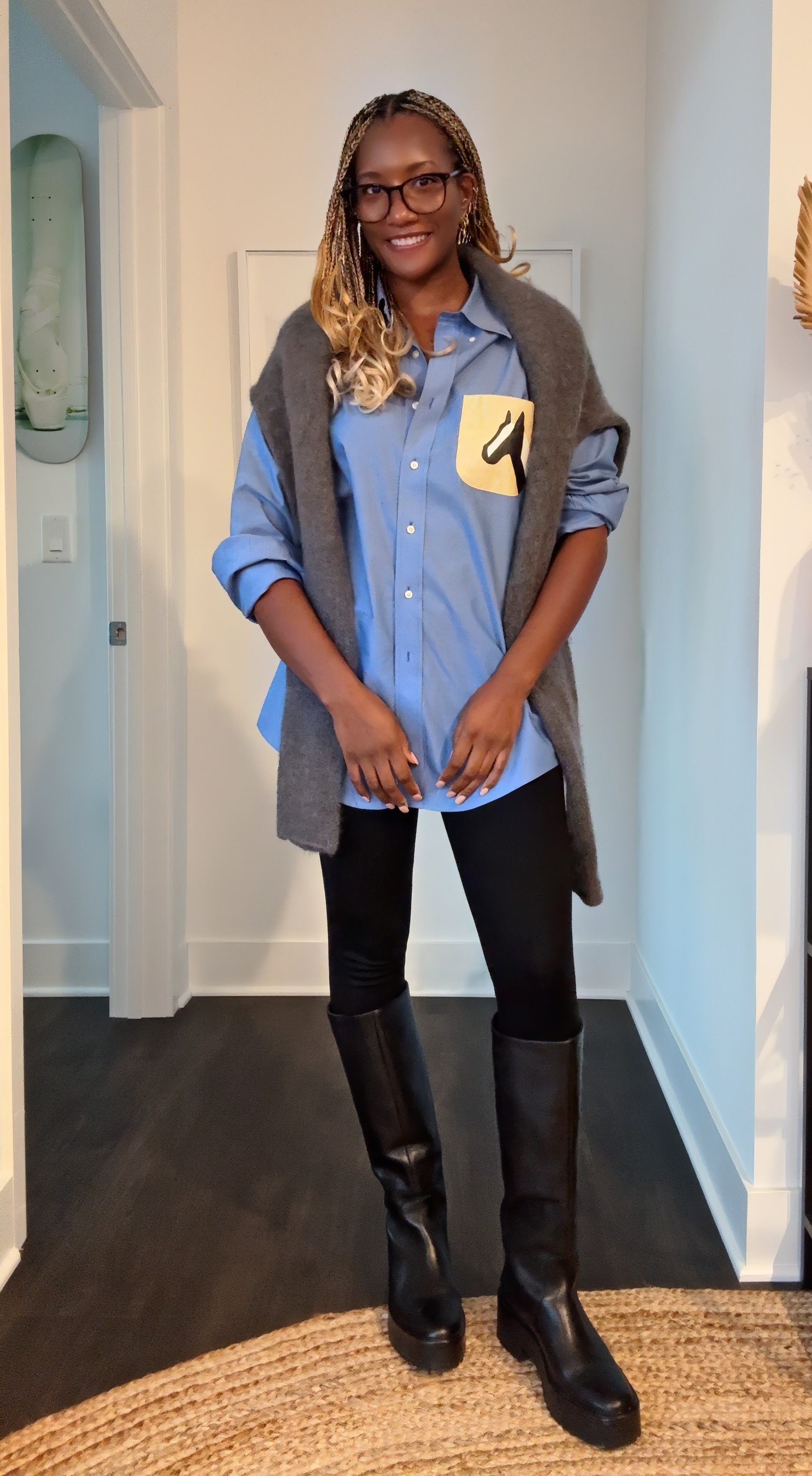 Danielle Prescod wearing leggings and a button-down