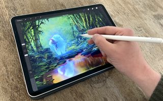 Photograph of reviewer drawing with the Apple Pencil 2