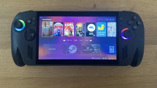 ASUS ROG Ally displaying Winhanced home screen with Steam, Game Pass, and Epic Games integration.
