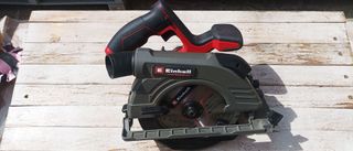 Red and grey Einhell PROFESSIONAL Cordless Circular Saw TP-CS 18/190 Li BL on whitewashed wood background