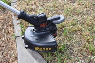 edging the lawn with the black + decker gh3000