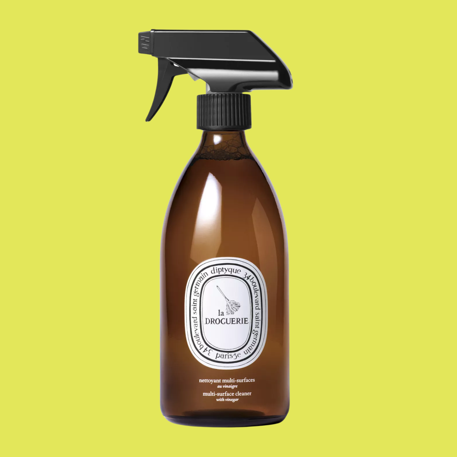 An amber spray bottle of surface cleaner