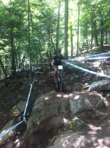 Heather Irmiger (Subaru-Trek) demonstates the best line for some juniors