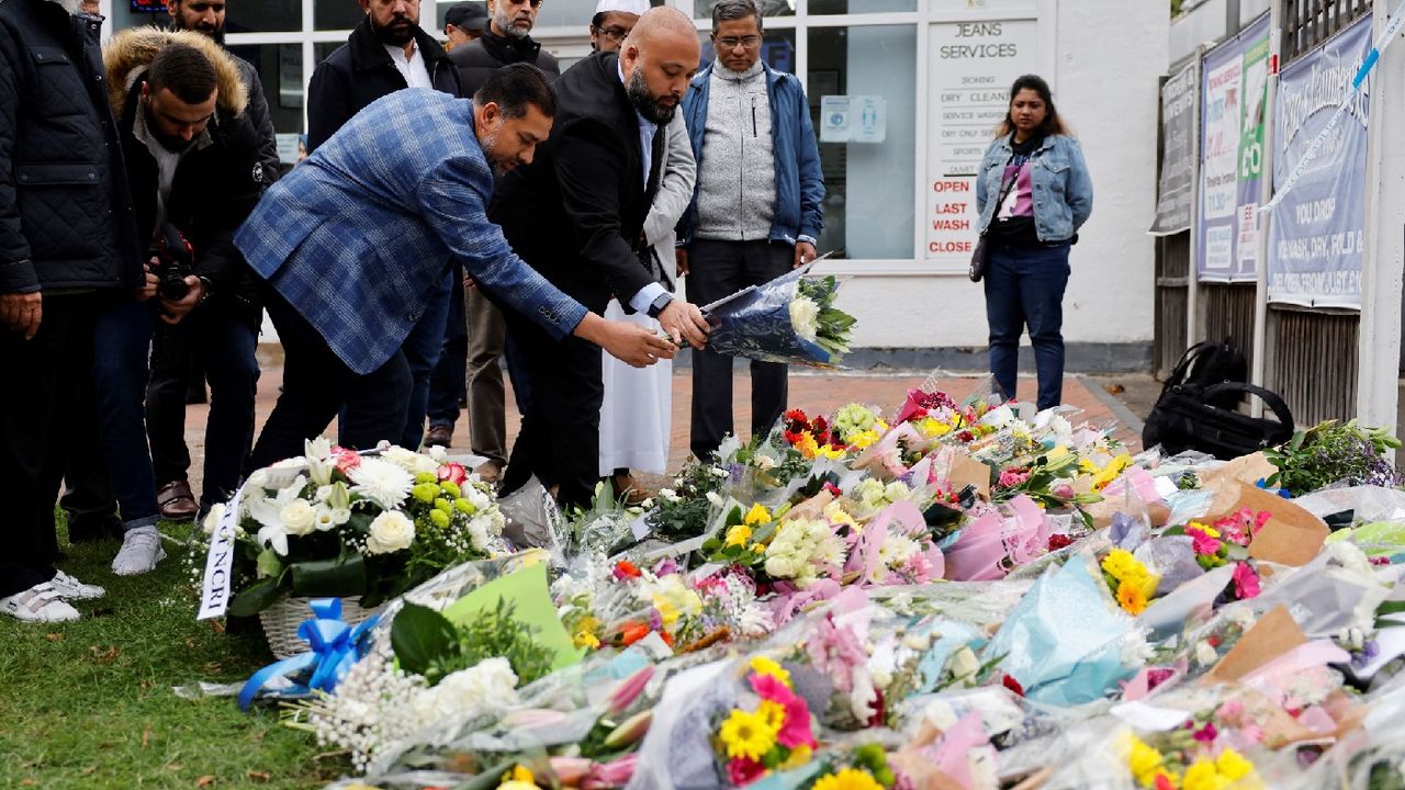 Tributes are left at the scene of the fatal stabbing of MP David Amess