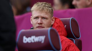Aaron Ramsdale of Arsenal looks on from the bench