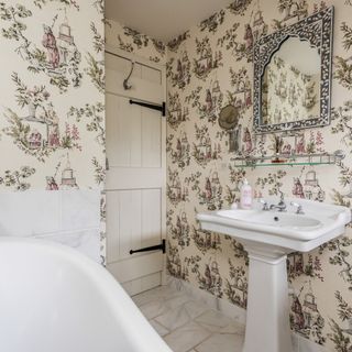 bathroom with toile de jouy wallpaper