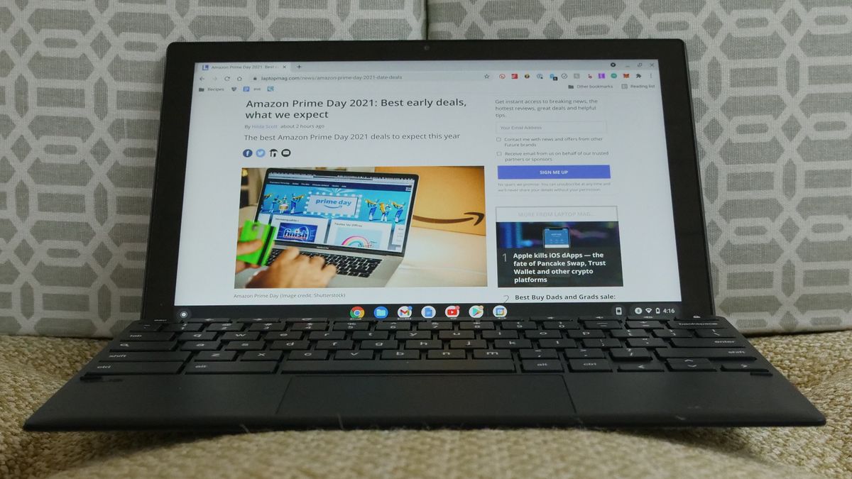 Asus Chromebook Detachable CM3 on a fabric covered bench