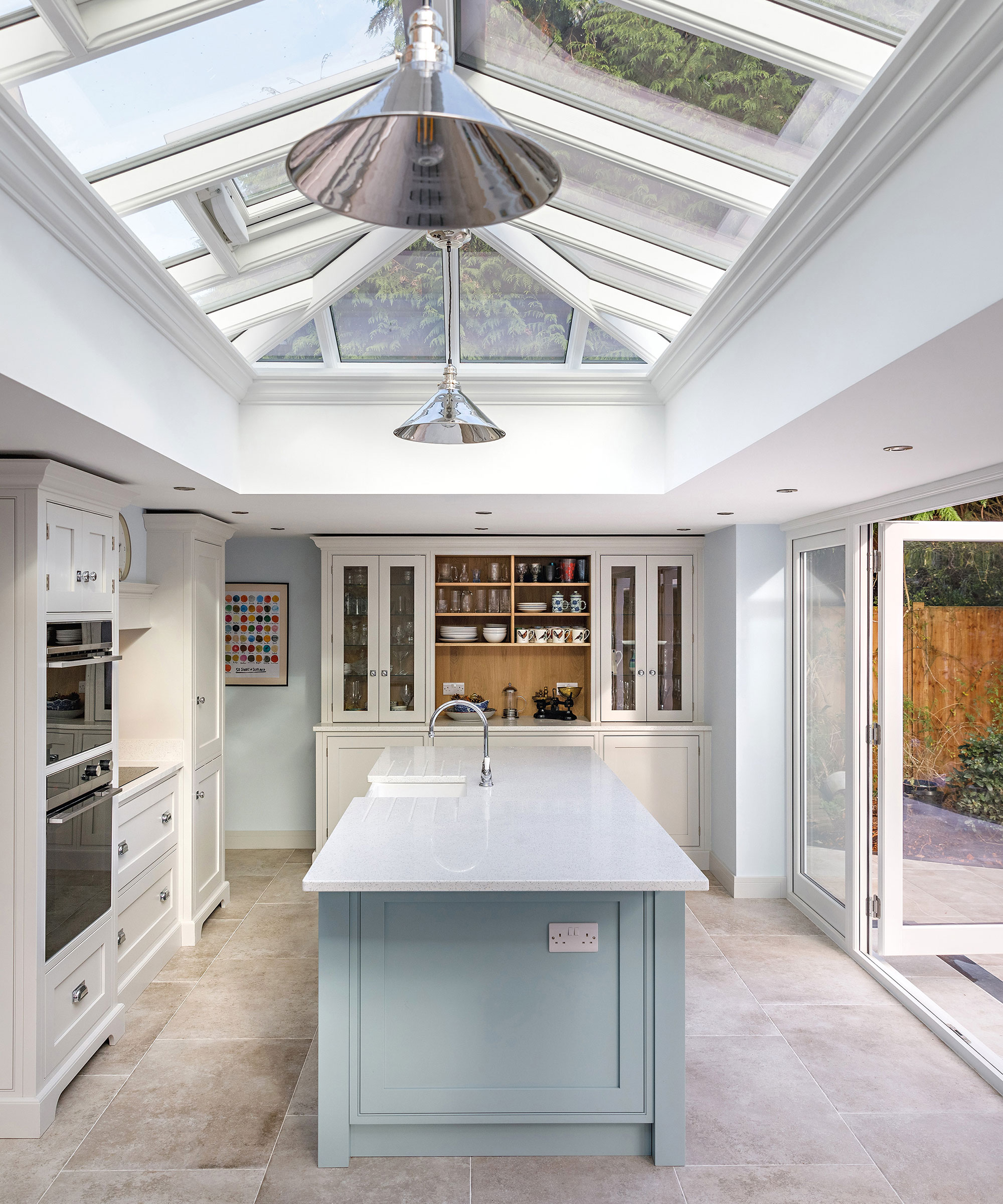 orangery kitchen with pale blue kitchen island
