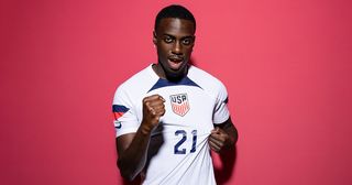 Timothy Weah of United States poses during the official FIFA World Cup Qatar 2022 portrait session at on November 15, 2022 in Doha, Qatar.