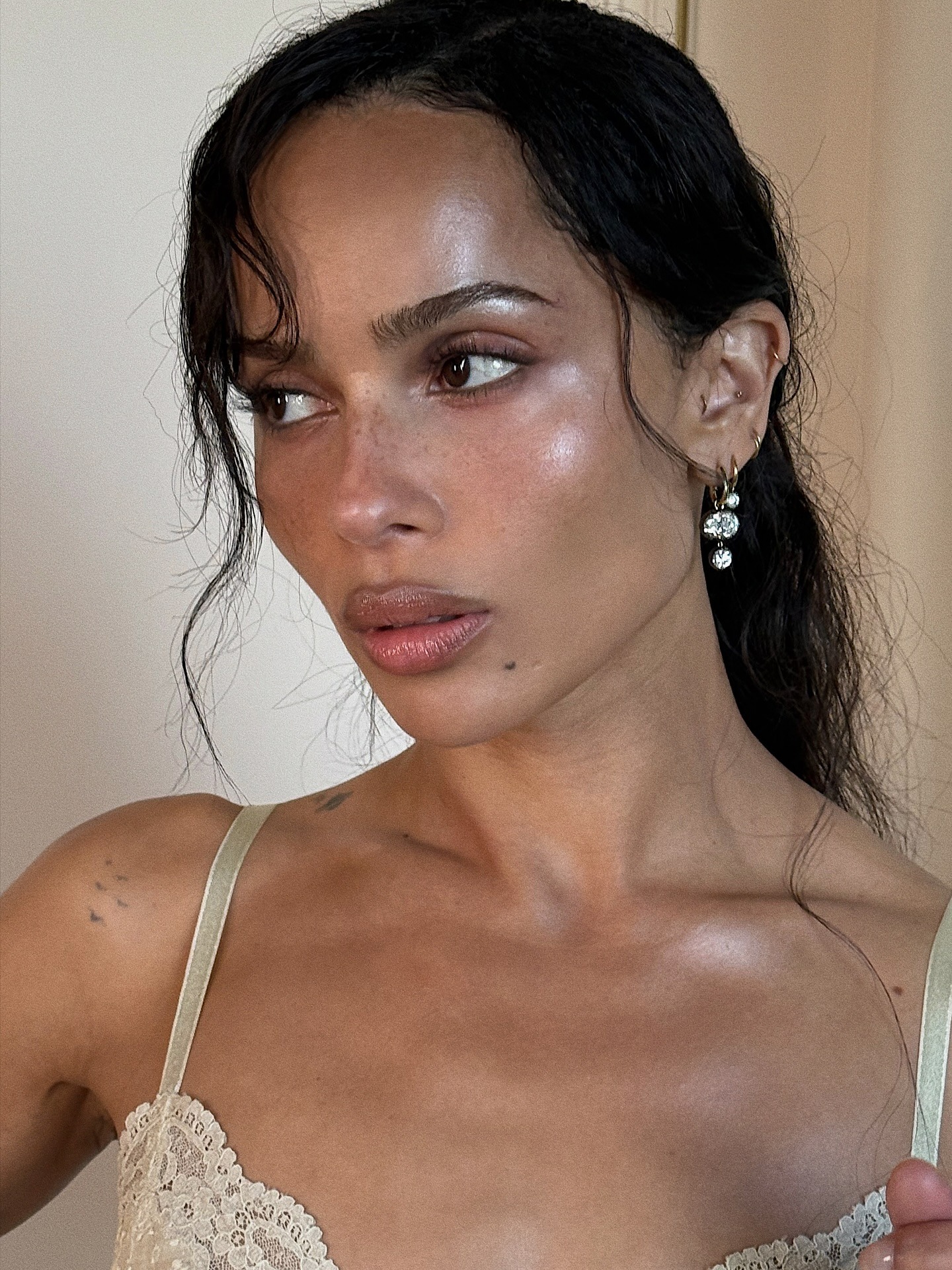 Zoe Kravitz wearing a side-parted ponytail