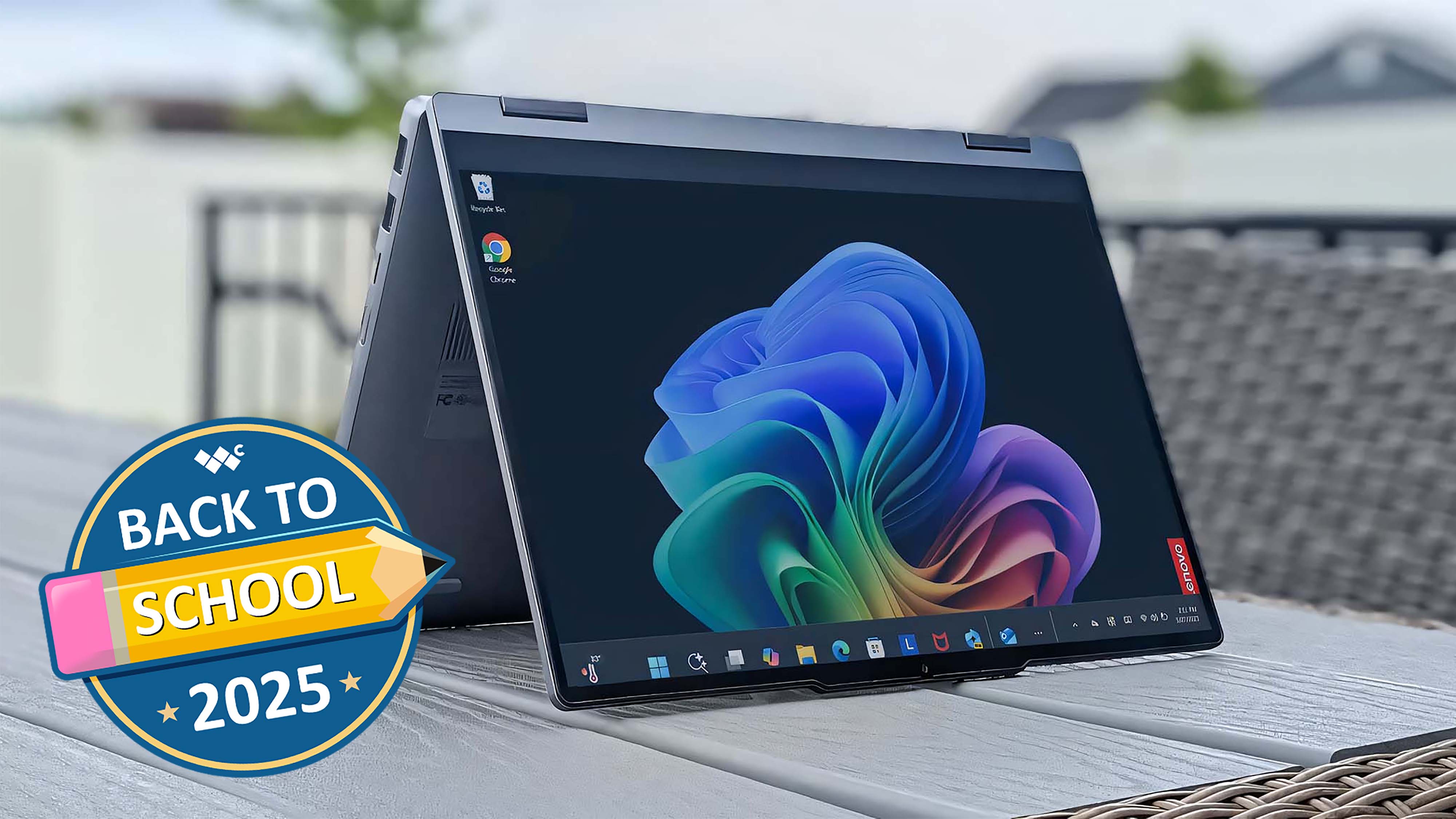 Lenovo IdeaPad 5X 2-in-1 on a table in tent mode. A graphic on top of the image reads, "Back to School 2025."