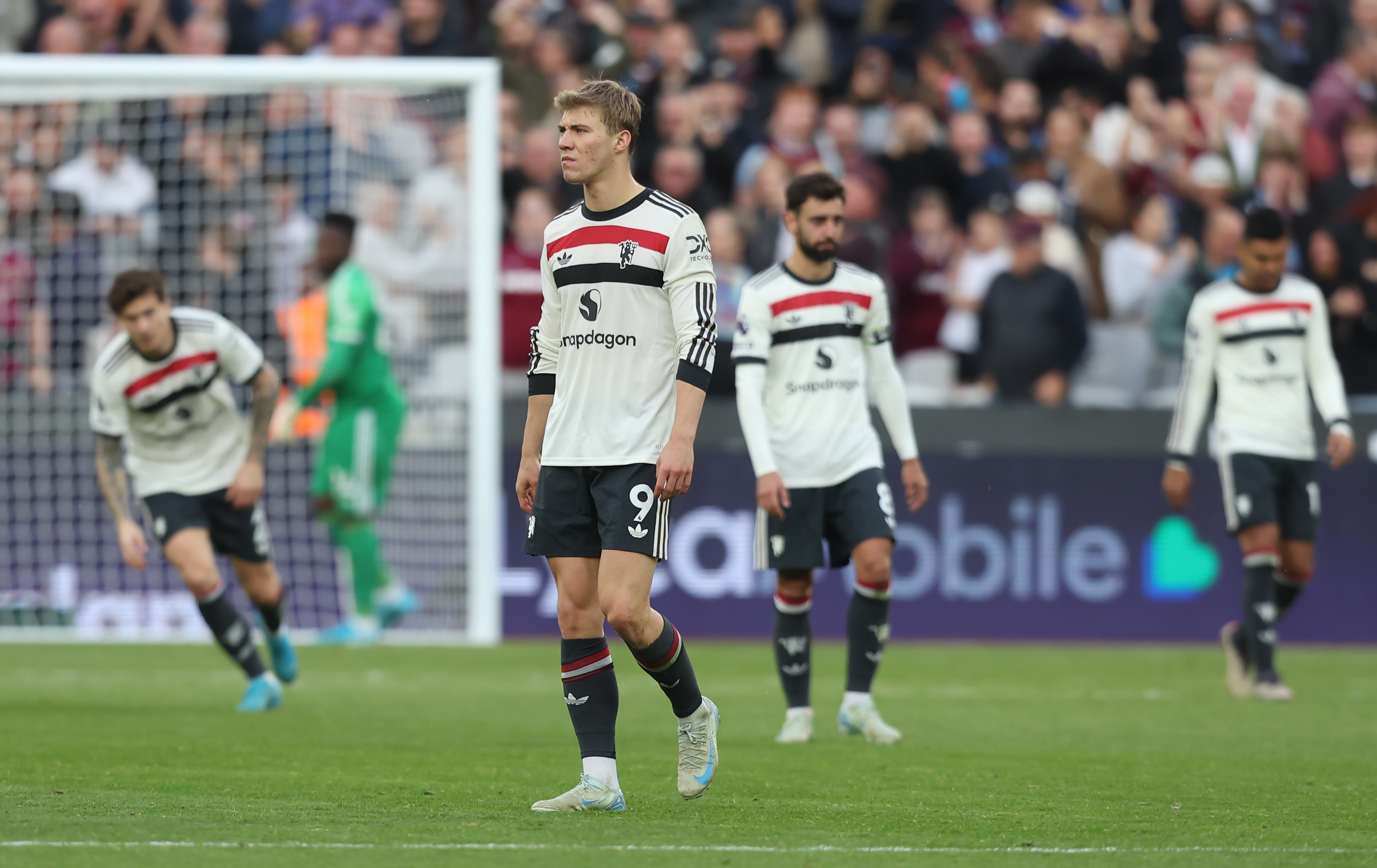 Manchester United players look dejected after conceding a goal to West Ham at the London Stadium in the Premier League in October 2024.